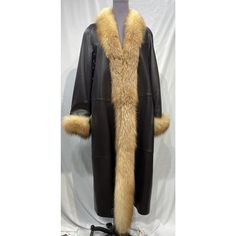 Brown Lamb Leather Coat W/ Crystal Fox Cuffs And Collar (88015). Fur Sample Sale Size: 12/14 Hook And Ring Up Front, 2 Pockets Length: 50 Inch From The Base Of The Collar To The Bottom Of The Hem Bust: 52.5 Inch Measured From Far Left Side To Far Right Side Underneath Armpit From The Inside Arms: 30 Inch From The Inside Of The Collar To End Of The Sleeve Sweep: 76 Inch From The Side To Side Along The Bottom White Cape, Open Front Vest, Beige Jacket, Vegan Leather Jacket, Puffer Jacket Women, Belted Jacket, Black Leather Belt, Vest White, Pink Jacket