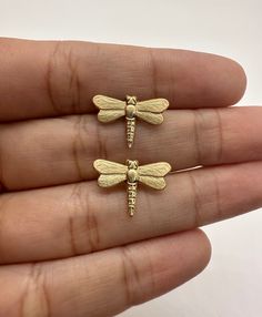 14K Dragonfly Earrings, Gold Dragonfly Studs, Minimalist Insect Earrings, Devil’s Arrow Earrings by AGoldMindJewelry on Etsy Gold Nickel-free Dragonfly Earrings, Nickel-free Gold Dragonfly Earrings, Insect Earrings, Gold Pinky Ring, Arrow Earrings, Dragon Fly, Dragonfly Earrings, Platinum Jewelry, Cotton Ball