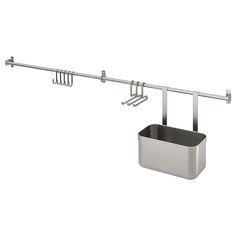 a metal pot and pan hanging on a rail