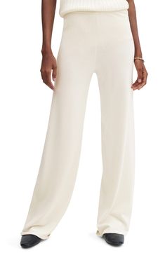 Feel at ease in these cozy knit pants punctuated with wide legs and topped with a comfortable pull-on waist. Pull-on style 75% viscose, 25% polyester Machine wash, line dry Imported Elegant Beige Knit Bottoms, Elegant Neutral Wide Leg Pants For Loungewear, Versatile White Wide Leg Loungewear Pants, White Relaxed Fit Knit Bottoms, Elegant Cream Wide Leg Lounge Pants, White Knit Pants For Spring, Spring White Knit Pants, Chic Cream Wide Leg Pants For Loungewear, White Wide Leg Pants With Elastic Waistband For Fall