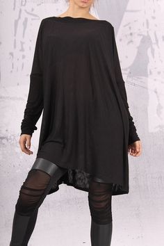 Lagenlook Asymmetrical Dress For Fall, Casual Black Asymmetrical Long Sleeve Dress, Casual Black Long Sleeve Asymmetrical Dress, Black Long Sleeve Asymmetrical Casual Dress, Fall Lagenlook Dress With Asymmetrical Hem, Oversized Dresses With Asymmetrical Hem For Fall, Fall Lagenlook Dresses With High-low Hem, Flowy Lagenlook Long Sleeve Dress, Flowy Lagenlook Dress With Long Sleeves