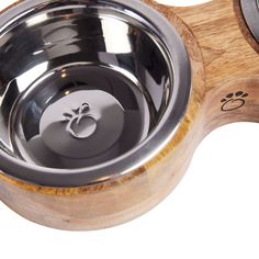 a stainless steel dog bowl with wooden handles