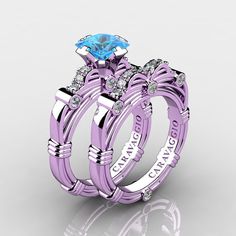 two wedding rings with blue topazte and diamonds