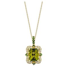 This collection features a selection of the most Olivia hue peridot gemstone. Uniquely designed this pendant with tsavorite and diamonds in Yellow gold to present a rich and regal look. Peridot Pendant in 18Karat Yellow Gold with Tsavorite and Diamond. Peridot: 3.86 carat, 10X8mm size, cushion shape. Tsavorite: 0.08 carat, 1.60mm size, round shape. Tsavorite: 0.08 carat, 1.60mm size, round shape. White Diamond: 0.26 carat, 1.50mm size, round shape, G color, VS clarity. Gold: 3.251g, 18Karat Yellow Gold. P434 Luxury Gold Tsavorite Necklaces, Luxury Yellow Gold Tsavorite Jewelry, Luxury Tsavorite Gemstone Necklace, Luxury Tsavorite Pendant Jewelry, Emerald-cut Tsavorite Fine Jewelry, Peridot Pendant, Peridot Gemstone, White Diamond, Jewelry Necklace Pendant