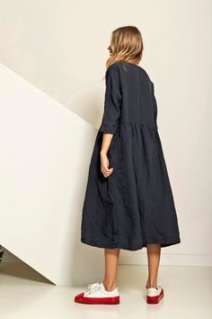 "Smock silhouette long summer dress from linen. Very flowy and voluminous it will fit all types of figures, while kimono cut sleeves add elegance. It's an iconic dress of linen lovers, rewarded for its comfort and versatility - you can move around, go out, walk, ride a bicycle, do whatever you like. And it has ... a pockets! Style it with stationary shoes if you want to create exceptional look. Double washed for extra softness and shrinkage prevention. Available in 40 c o l o r s! ABOUT US LINEN Relaxed Fit A-line Linen Midi Dress, Oversized Linen Midi Dress, Linen Summer Dresses, Linen Slip Dress, Ruffle Linen, Midi Dress For Women, Linen Tunic Dress, Linen Shift Dress, Wearing Color