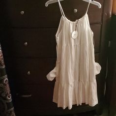 Nia Brand Size L 60% Tencel 40% Linen White Flowy A-line Sundress For Brunch, White Sleeveless Tiered Dress For Day Out, Breezy A-line Vacation Dress, Casual A-line Mini Dress For Daytime, White Casual Tiered Dress For Summer, White Flowy Tiered Dress For Vacation, Casual White Tiered Dress For Summer, Flowy White Tiered Dress For Vacation, Flowy Breezy Dress For Daytime