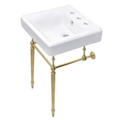 a white sink sitting on top of a metal stand with two holes in the middle