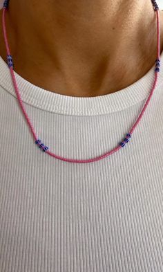 Handmade by Koï Design Pink Miyuki beads Blue striped glass beads Blue string Adjustable(you can use it short or long) Carefully and nicely packaged and sent you with our choosen gift Handmade Minimalist Pink Necklaces, Pink Handmade Minimalist Necklaces, Handmade Minimalist Pink Necklace, Pink Handmade Minimalist Necklace, Minimalist Handmade Pink Necklace, Pink Beaded Necklace With Tiny Beads For Gift, Dainty Pink Beaded Necklaces For Gifts, Dainty Pink Beaded Necklace For Gift, Dainty Pink Beaded Necklaces With Colorful Beads