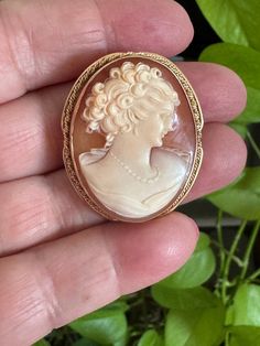 "Stunning 14K gold petite Cameo Pin and Pendant.  Has a fold down bale so you can wear this as a brooch or pendant.  1.50\" High with out bale x 1.20\" wide Hallmarked both on the pin back and the frame 14K gold Package will ship priority Mail Insured.  For more items click on :  http://www.etsy.com/shop/MISSIONMOD?ref=pr_shop_more  **ALL METALS AND STONES ARE TESTED TO BE SUCH,BUY WITH CONFIDENCE THAT HERE AT MISSION*MOD WE STRIVE TO BRING YOU THE BEST WE CAN FIND...RANGING FROM VINTAGE TO ANTI Antique Clothing, Pin Backs, Pin Brooch, Priority Mail, Antique Jewelry, Brooch Pin, Vintage Antiques, Jewelry Necklace Pendant, Vintage Outfits