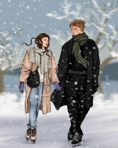 a man and woman walking in the snow