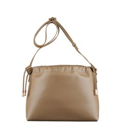 A.P.C. Women's bag.- Recycled leather-like material. - Magnetic inside closure. - Drawstring closure on top. - Shoulder strap to wear the bag on the shoulder or across the chest. - One interior pocket. - Goldtone 'A.P.C. rue Madame Paris' logo embossed on the front. - In the Ninon product line. Paris Logo, Faux Leather Bag, Exclusive Clothing, Backpack Tote Bag, Recycled Leather, Scarf Jewelry, Tote Backpack, Weekender Bag, Cloth Bags