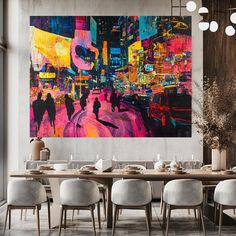 a large painting hanging on the wall above a dining room table with chairs and place settings