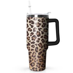 a leopard print travel mug with a straw in it