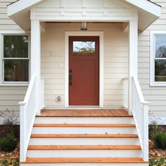 a house with steps leading to the front door