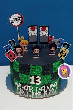 a decorated birthday cake with pictures on it