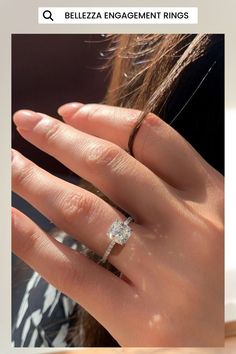 a woman's hand with a ring on it and the words, shop now