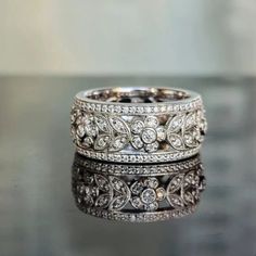 three wedding bands with diamonds on them