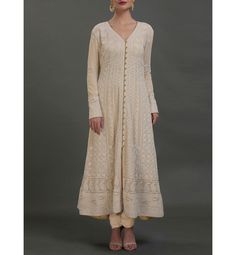 Get regal and festive with this exquisite, heavy all over hand embroidered tunic kurta dress!! When it is time to celebrate, this dress is a must!! All over delicate, exquisite Hand Embroidery called Chikankari Made to Order, tailored dress Average length: 48 in Length of product may slightly vary as per the sizes. Please note: smaller size may be slightly shorter and bigger size may be slightly longer in length Can purchase the whole set or just the Kurta Dress Available in may colors Fully cus Luxury Long Cream Kurta, Luxury Semi-stitched Floor-length Churidar, Luxury Straight Kurta Churidar With Chikankari Embroidery, Luxury Churidar With Chikankari Embroidery And Straight Kurta, Luxury Long Churidar With Chikankari Embroidery, Kurta Maxi Dress, Long Midi Dress Indian, Extra Long Leggings, Hand Embroidered Tunics