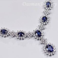 For the truly sophisticated connoisseur, this tanzanite diamond necklace makes a spectacular statement on elegance and artistry! It will be professionally handmade of solid 14 karat white gold, and highly polished for a very shiny smooth look. The links are 4-prong set with natural violet-blue oval-cut tanzanites, all totaling approximately 11.37 carats. They're haloed by 6.25 carats of gleaming white round brilliant-cut genuine diamonds (VS2-SI1 clarity, F-G color). Our women's gemstone necklac Luxury Gold Tanzanite Necklace, Blue Diamond Necklace For Formal Occasions, Luxury Blue Diamond Necklace For Formal Occasions, Dazzling Sapphire Necklace For Formal Occasions, Luxury Tanzanite Necklace With Brilliant Cut, Sapphire Diamond Necklace For Formal Occasions, Elegant Tanzanite Necklace As Gift, Elegant Tanzanite Necklace For Gift, Formal Sapphire Diamond Necklace In Fine Jewelry Style