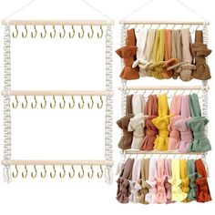 several rows of baby clothes hanging from hooks on a white wall with clips attached to the hangers