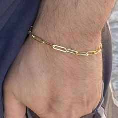 Paperclip link chain 4mm bracelet. 14k gold plated over 925 silver. Choose 6.5", 7", 7.5", 8" , 8.5" inch. Weigh 4-5 grams depending on size. Real 925 sterling silver wrist piece. Handmade bracelet is made in Italy. Stamped 925 Italy on the lobster lock. Will never turn your wrist green. FREE SHIPPING in USA. Order now! Gold Link Paperclip Bracelet As Gift, Gold Link Bracelet As Gift, Gold Link Bracelet Gift, Yellow Gold Sterling Silver Link Chain Bracelet, Gold Paperclip Bracelet With Rectangular Links As Gift, Gold Chain Link Paperclip Bracelet As Gift, Gold Chain Paperclip Bracelet As Gift, Gold Sterling Silver Chain Bracelet With Lobster Clasp, Gold Plated Oval Link Paperclip Bracelet Gift