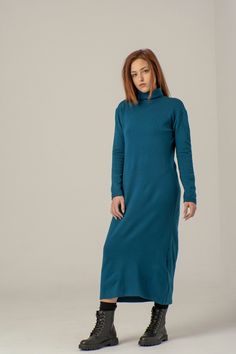 "Petrol Blue Wool Sweater Dress, Festive Women Dress, Winter Wool Dress ABOUT THE DRESS: Knitted Turtleneck Dress with long sleeves. The sweater dress will keep you looking stylish during the cold months. It is perfect for any occasion or for everyday use. Enjoy the comfortable and trendy minimalist dress. *COMPOSITION* Wool, Аrylic *CARE* Gentle hand wash 30oC Model is wearing size S. She is 5'9\"/170 cm tall. This piece is available in sizes from XS, S, M, L, XL, XXL *COLORS* Please, always re Light Blue Fall Daywear Dress, Elegant Blue Winter Maxi Dress, Light Blue Daywear Dress For Fall, Elegant Blue Maxi Dress For Winter, Light Blue Dresses For Fall Daywear, Light Blue Dresses For Daywear In Fall, Winter Light Blue Stretch Dresses, Light Blue Long Sleeve Dress For Daywear, Light Blue Long Sleeve Daywear Dress