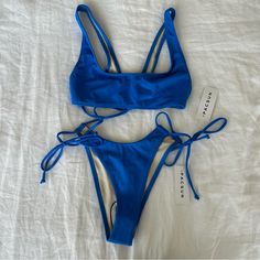 Pacsun Taylor Bikini Size Xs Nwt - New With Tags Taylor Tank Bikini Top & Tie Side Bottom. Brand New And Never Worn, Still Has The Hygiene Liner. Bought These For A Trip And Never Ended Up Wearing Them. Feel Free To Message With Offers Or If You Are Interested In Buying The Top/Bottom Separately! Blue Strappy Swimwear For Pool, Blue Fitted Strappy Swimwear, Blue Strappy Swimwear For Beachwear, Blue Strappy Swimwear For Sunbathing, Blue Strappy Beachwear Swimwear, Blue Strappy Swimwear For Vacation, Blue Strappy Swimwear For Summer, Pacsun Swim, Pretty Swimsuits