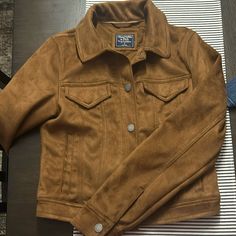 Brown Abercrombie & Fitch Suede Jacket Never Worn Size Small Classic Brown Cropped Long Sleeve Jacket, Classic Brown Long Sleeve Cropped Jacket, Classic Brown Cropped Jacket For Fall, Classic Long Sleeve Brown Cropped Jacket, Abercrombie And Fitch, Abercrombie & Fitch, Suede Jacket, Abercrombie Fitch, Jackets & Coats