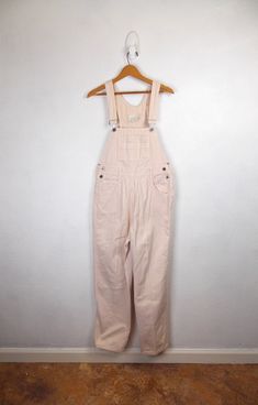 "Vintage 1990's women's overalls in off white heavy weight cotton twill.  Very good vintage condition.  Label: MODA INTL The London Jean 100% cotton Size: M* Inseam 29\" Rise 13\" Waist 32\"/34\" Hips 42\" *Please note that vintage clothing and contemporary sizes can vary greatly. We take measurements of listed garments by laying the garment flat and then doubling the measurement. When considering whether a garment would fit, we suggest taking a similar garment from your own wardrobe and measure it lying flat as we do. Then compare the measurements." Vintage Spring Workwear Overalls, Vintage Cotton Shortalls For Spring, Beige Cotton Overalls, Jumpsuit Jeans, Black Denim Overalls, Womens Overalls, High Waisted Denim Skirt, Women's Overalls, Pencil Skirt White