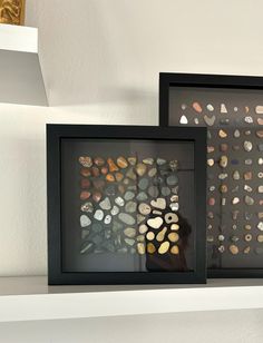 there are two framed pictures with rocks in them