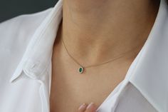 "Emerald Jewelry / 14k Gold Emerald Necklace with Halo Diamonds / Classic Emerald Necklace / Mini Emerald Necklace / May Birthstone Necklace * Made to Order * Gold Kt: 14K (also available in 18K) * Available Gold Color: Rose Gold, Yellow Gold, White Gold * Round Diamond: 14 pcs 1.2 MM * Oval Emerald: 1 pc 5 x 3 MM * Diamond Carat Weight: 0.12 ctw * Emerald Carat Weight: 0.25 ctw * Diamond Color-Clarity: G Color SI Clarity If you have any additional questions about this ring, just hit the \"Messa Fine Jewelry Necklaces With Jewels For Anniversary, Fine Jewelry 14k Gold Necklaces With May Birthstone, 14k Gold Necklace With May Birthstone, Fine Jewelry, 14k Gold Fine Jewelry Necklace For May Birthstone, 14k Gold Necklace For May Birthstone, Fine Jewelry, Fine Jewelry Oval Emerald Necklace With Jewels, Oval Emerald Necklace With Jewels In Fine Jewelry Style, Oval Emerald Necklace With Jewels, Oval Jeweled Necklaces For Anniversary