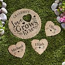 garden stepping stones with the words grandma, love grows here