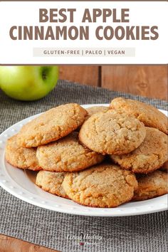 the best apple cinnamon cookies on a white plate with an apple in the background and text overlay