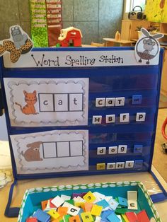 the word spelling station is set up with letters and numbers to spell out words on it