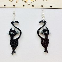 Sassy Black Cat Acrylic Earrings, Laser Cut Black Glitter Acrylic Statement Earrings, Handmade Cat E Black Cat Design Drop Earrings, Black Cat Ears Earrings For Party, Glitter Force Costume, Acrylic Earrings Laser Cut, Glowforge Ideas, Cat Acrylic, Black Cat Earrings, Glitter Pumpkins, Glitter Acrylic