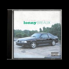 an album cover with a car parked in the parking lot