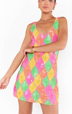 Turn heads in our vibrant Low Down Mini! Bright sequin detailing shapes this shift dress, while its v-neck cut adds some extra flair. Perfect your night out look with dainty jewelry and platform heels. Neon Diamond, Fun Fits, Tie Dye Tops, Lavender Brown, Mumu Dress, Cami Nyc, Tanya Taylor, Tony Bianco, Mini Tank Dress