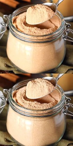 two jars filled with different types of food and one has a spoon in the jar