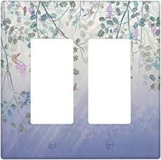 two light switch plates with floral designs on them