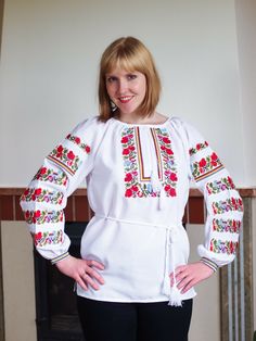 Ukrainian Embroidered Blouse (Vyshyvanka) Embroidered Ukrainian Blouse for women (vyshyvanka) with traditional embroidery on chest and sleeves. Material of blouse is homespun fabric (100% cotton).  Available sizes are XS - XXXL or any custom size by measurements of client. Please find below our size chart: Size US size EU size  Ukr. Size              Inches              Centimetres Bust Waist Hips Bust Waist Hips XS 2 34 40 31,5 24,0 34,5 80 61 88 S1 4 36 42 33,0 25,5 36,0 84 65 92 S2 6 38 44 34 Ukrainian Blouse, Shirt For Ladies, Traditional Embroidery, Homespun Fabric, Ladies Blouse, Blouse For Women, Embroidered Blouse, Custom Sizing, Blouses For Women