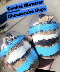 two desserts with blue and white frosting in glass bowls on top of each other