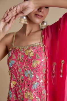 Pink kurta with multicolor cutdana, gold sequin, mirror embellishment in floral pattern. Paired with embellished palazzo and dupatta. - Aza Fashions Embellished Sleeveless Sets For Festivals, Embellished Sleeveless Festival Sets, Pink Sleeveless Sets With Mirror Work, Sleeveless Summer Reception Sets, Pink Sleeveless Sets With Zari Work, Multicolor Sleeveless Sets With Mirror Work, Multicolor Sleeveless Wedding Set, Fitted Sleeveless Sets With Mirror Work, Sleeveless Fitted Sets With Dupatta