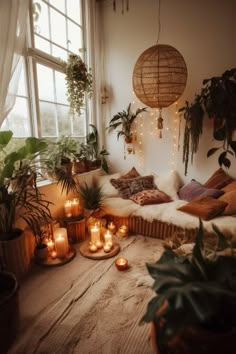 a living room filled with lots of plants and candles