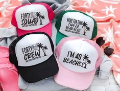 four hats that say fortale squab and i'm aloh beach