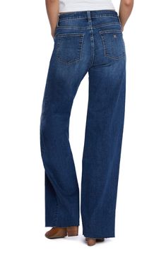 Effortlessly cool and relaxed, these mid-rise, full-length jeans are made from innovative stretch denim with lived-in fading and raw hems. 32" inseam; 19 1/2" leg opening; 9 1/2" front rise 67% cotton, 21% REPREVE® recycled polyester, 8% polyester, 3% rayon, 1% spandex REPREVE recycled polyester is made from 100% post-consumer recycled plastic bottles Machine wash, tumble dry Imported Relaxed Fit Dark Wash Denim Flare Jeans, Medium Wash Straight Fit Denim Flare Jeans, Medium Wash Straight Fit Flare Jeans, Denim Blue Mid-rise Relaxed Fit Flare Jeans, Medium Wash Wide Leg Straight Fit Jeans, Medium Wash Wide Leg Jeans With Straight Fit, Mid-rise Washed Blue Flare Jeans In Recycled Denim, Mid-rise Washed Blue Recycled Denim Flare Jeans, Mid-rise Dark Wash Flare Jeans In Recycled Denim