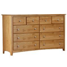 a wooden dresser with many drawers and knobs