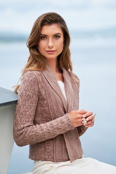 Kathe is a straight cardigan with a scarf collar enhanced with an elegant textural all-over lace. The reversible fern pattern adorns the body and sleeves while the collar is divided from it by a tuck and knitted in moss stitch. You can wear the collar hanging flat – overlapping – and pinned together or folded.Sizes: XS (S, M, L, XL, 2XL)Finished measurements:Bust: 79 (85, 93, 100, 110.5, 120.5)cm/31 (33.5, 36.5, 39.25,43.5, 47.5)"Length: 49.5 (50, 51.5, 56, 57, 58.5) cm/19.5 (19.75, 20.25, 22, Fern Pattern, Cowl Dress, Pdf Knitting Pattern, Red Heart Yarn, Dress Gloves, Cardigan Pattern, Sweater Pattern, Knitting Inspiration, Crochet Cardigan