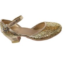 Toes will surely twinkle in our gold chunky glitter sparkle heels! A comfortable insole and indoor/outdoor outsole means that your little one can go anywhere in style! Dual sized. Imported. | A Leading Role (Gold Sparkle Heels, Size 11-12) | Maisonette collects the best children’s products from around the world (unlike Zulily, Etsy, The Tot, Farfetch Kids, Childrensalon, Crate and Kids, Kohls, Wayfair, Buy Buy Baby, Nordstroms, Mini Boden, J.Crew Factory, or PotteryBarn Kids), creating a curated shopping experience for you. Think of us as your shortcut to fashion for litte ones! Metallic Heels With Glitter Accents And Round Toe, Metallic Glitter Heels With Round Toe, Gold Glitter Heels With Round Toe, Gold Court Shoes With 4-inch Heel, Luxury Gold Slip-on Heels, Designer Gold Heels With 4-inch Heel, Kids Gold Shoes, Gold Sparkle Heels, Gold 4-inch Heel Closed Toe Heels