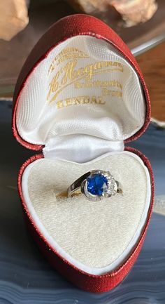 Item: Vintage 10K White Gold Sapphire Blue Iolite Ladies Ring. This is stamped 10K. The blue and white stones are all testing as Iolite using a Presidium Gemstone tester. The ring box shown in the photos is not included in the sale of the ring. Measurements: Size 4.5. It weighs 2.74 grams. Condition: Vintage, previously owned. Under magnification I can see a couple of tiny pin prick sized nicks and scratches on the blue stone. Nothing major. There may be other very minor signs of age/use. Vintage Blue Sapphire Ring Stamped 14k, Vintage Blue Gemstone Birthstone Ring, Vintage Sapphire Ring As A Gift, Vintage Sapphire Ring For Gift, Blue Birthstone Ring Stamped 14k As Gift, Blue Heirloom Birthstone Ring, Blue Heirloom-style Birthstone Ring, Blue Sapphire Ring Stamped 14k, Blue Sapphire Ring Stamped 14k For Gift