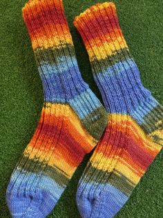 Got smaller feet? These handknit socks could have been made just for you. If you want crazy, bold colors, cart this pair of socks now!  Fits smaller foot, heel to toe length is about 8 inches. Six inch ribbed cuff, never binding. Made on fine needles with a fine yarn. Sock fiber is 75% wool, 25% nylon..easy to wear, easy to care. Machine wash cold, dry flat. Handmade Casual Socks For Fall, Casual Warm Multicolor Socks, Handmade Multicolor Casual Socks, Casual Handmade Multicolor Socks, Casual Multicolor Handmade Socks, Casual Multicolor Knitted Socks, Handknit Socks, Cozy Multicolor Knitted Socks, Multicolor Cozy Knitted Socks